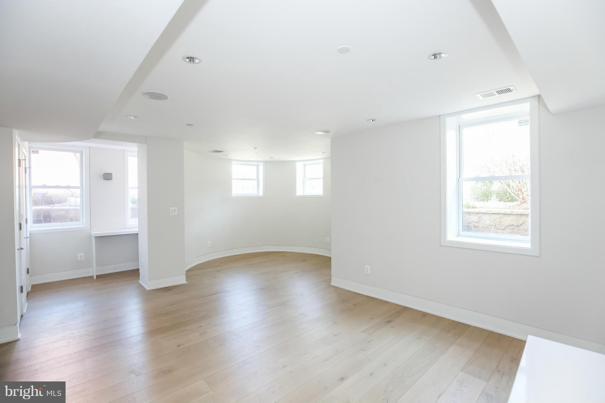 1700 Q Street Northwest, Unit 1 Washington, DC 20009 - Photo 7 of 18 Sunlit Living Room