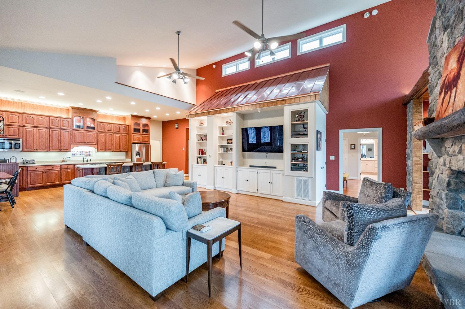 657 Cherry Hill Road Amherst, VA 24521 - Photo 14 of 91 a living room with furniture and a flat screen tv