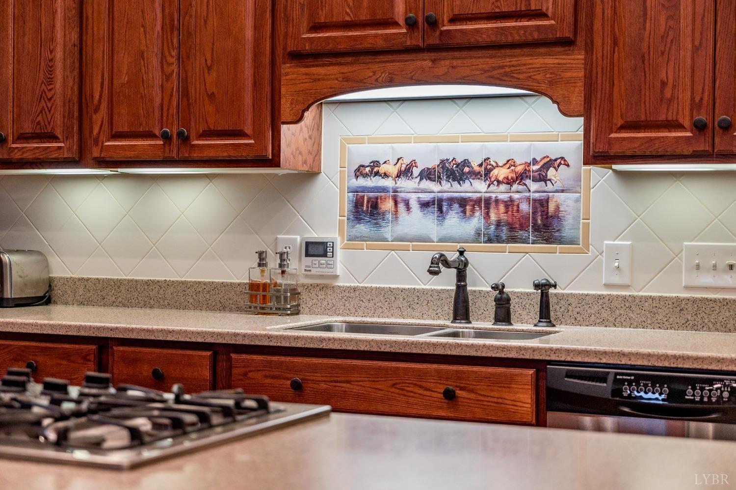 657 Cherry Hill Road Amherst, VA 24521 - Photo 20 of 91 a kitchen with stainless steel appliances granite countertop a stove and a microwave