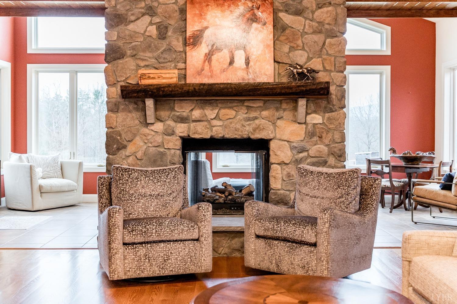 657 Cherry Hill Road Amherst, VA 24521 - Photo 24 of 91 a living room with furniture and a fireplace