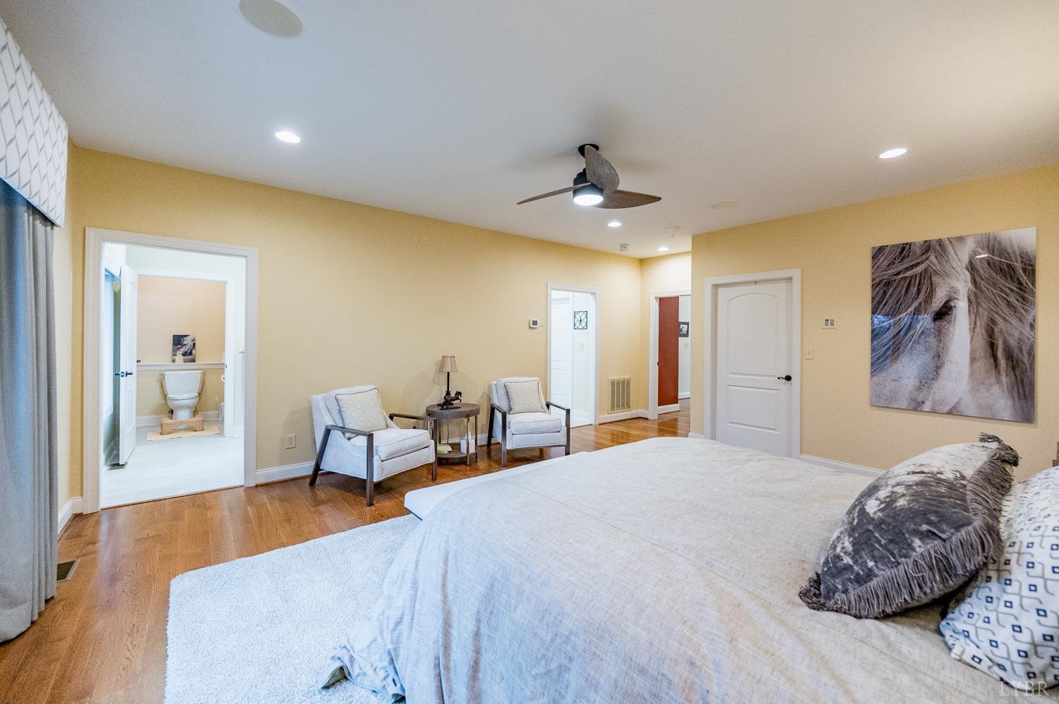 657 Cherry Hill Road Amherst, VA 24521 - Photo 32 of 91 a bedroom with a bed and a couch