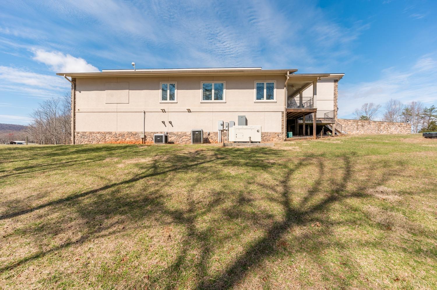 657 Cherry Hill Road Amherst, VA 24521 - Photo 85 of 91 a house view with swimming pool in front of it