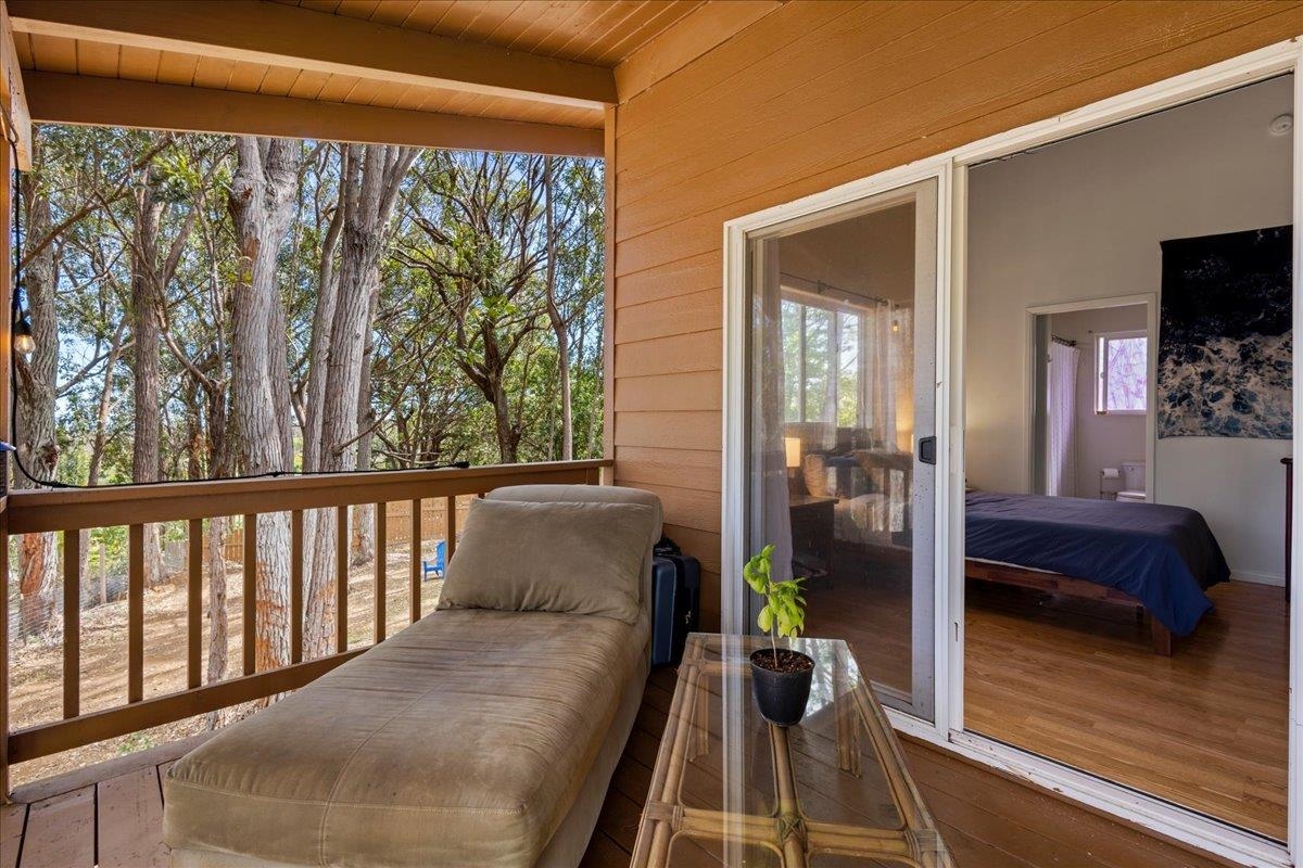 10 Poko Way, Unit B Haiku, HI 96708 - Photo 16 of 37 a living room with furniture and a flat screen tv