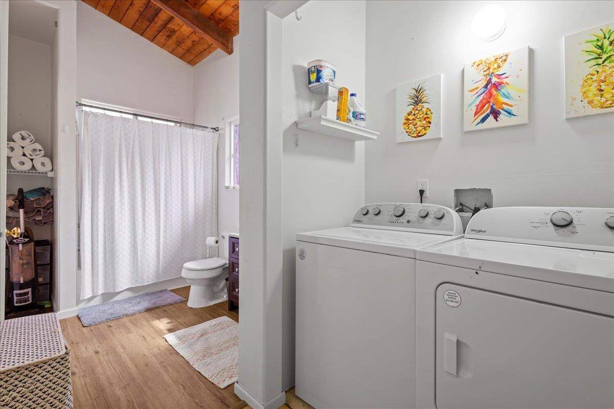 10 Poko Way, Unit B Haiku, HI 96708 - Photo 21 of 37 a bathroom with a sink mirror vanity and toilet