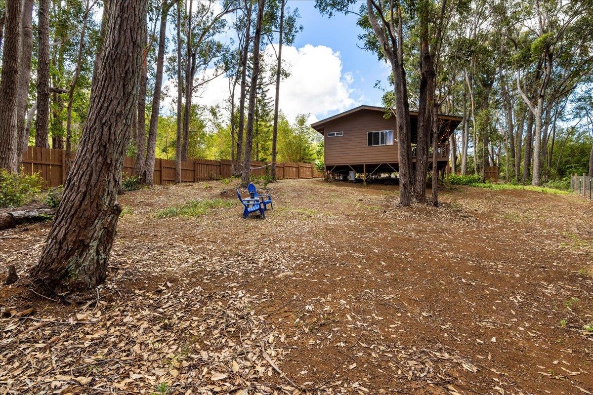 10 Poko Way, Unit B Haiku, HI 96708 - Photo 24 of 37 a view of a house with a backyard and tree