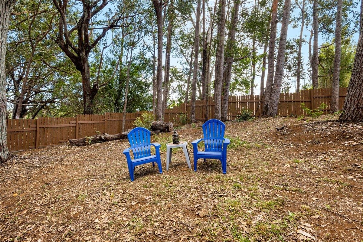 10 Poko Way, Unit B Haiku, HI 96708 - Photo 30 of 37 a backyard of a house with table and chairs