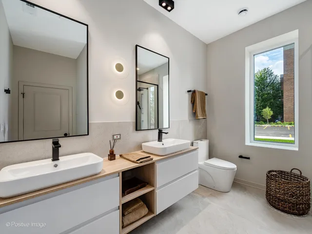 a bathroom with a shower and a sink