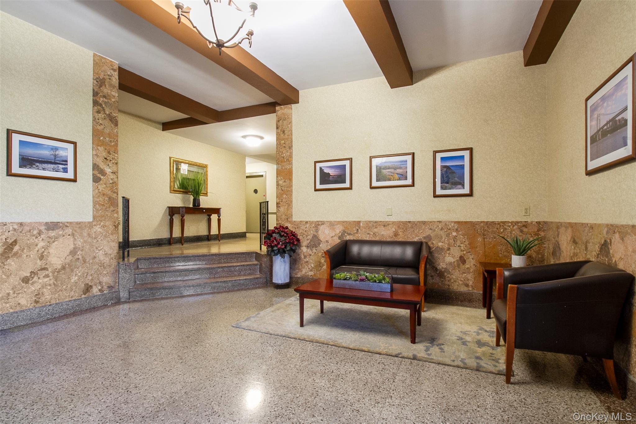 565 Broadway, Unit 4A Hastings-on-Hudson, NY 10706 - Photo 3 of 19 a living room with furniture and a wooden floor