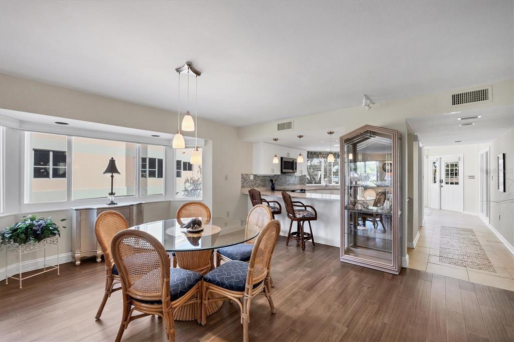 11000 Placida Road, Unit 702 Placida, FL 33946 - Photo 16 of 60 a dining room with furniture and window