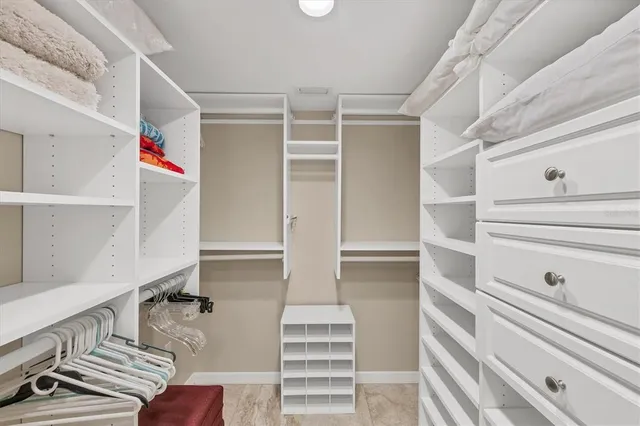 an aerial view of a house with a lake view