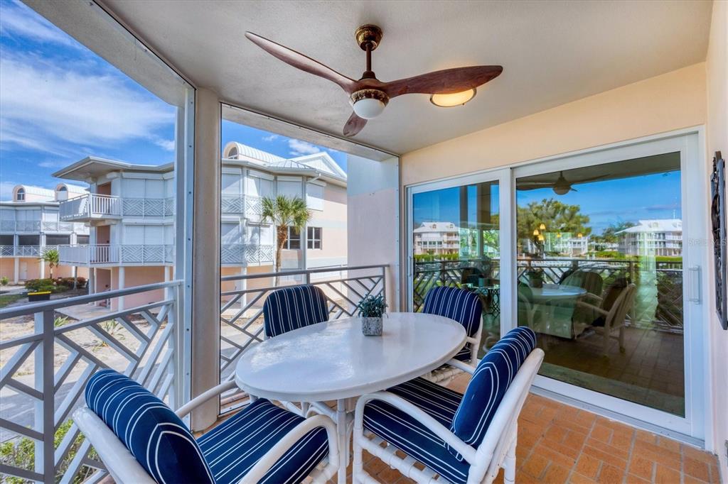 11000 Placida Road, Unit 702 Placida, FL 33946 - Photo 30 of 60 a view of a dining room with furniture window and outside view