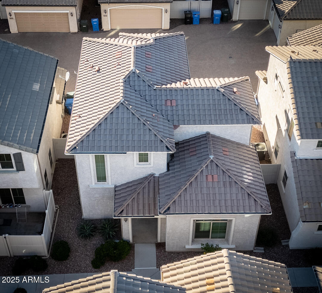 1958 West Busoni Place Phoenix, AZ 85023 - Photo 36 of 42 a aerial view of a house with a roof deck