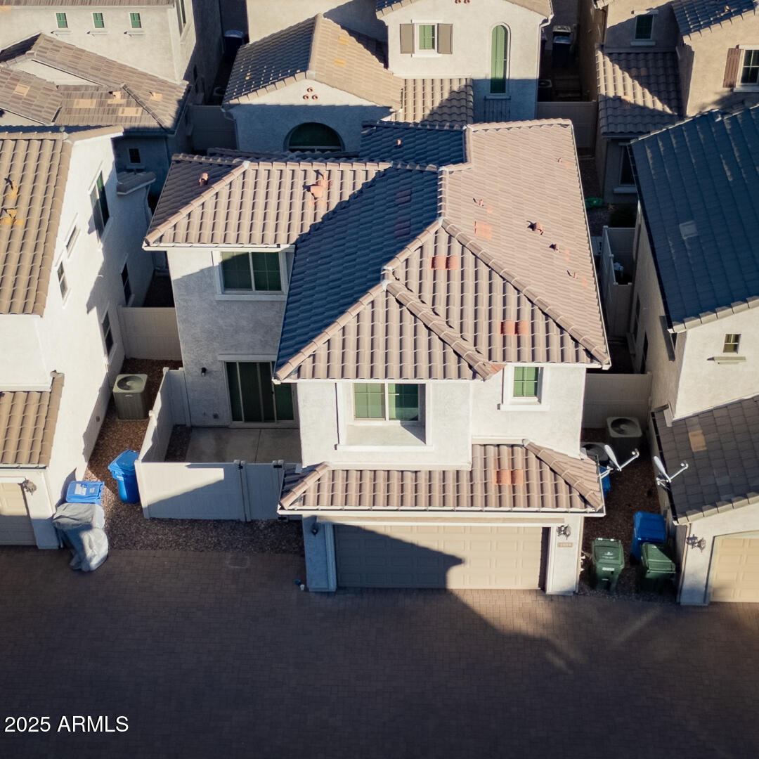 1958 West Busoni Place Phoenix, AZ 85023 - Photo 38 of 42 a view of a house with backyard and sitting area