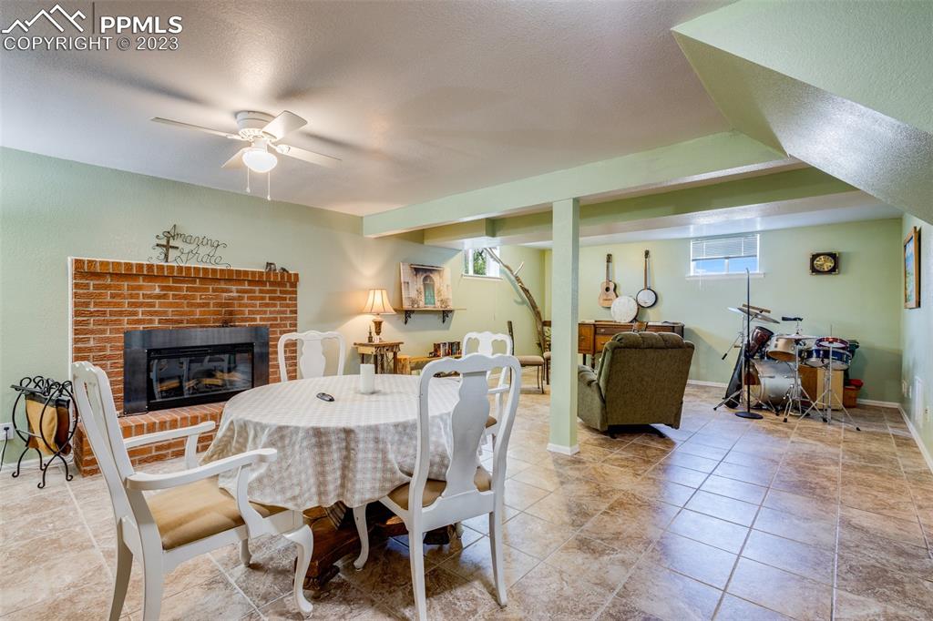 13490 South Lauppe Road Yoder, CO 80864 - Photo 14 of 45 a view of a livingroom with furniture and a fireplace
