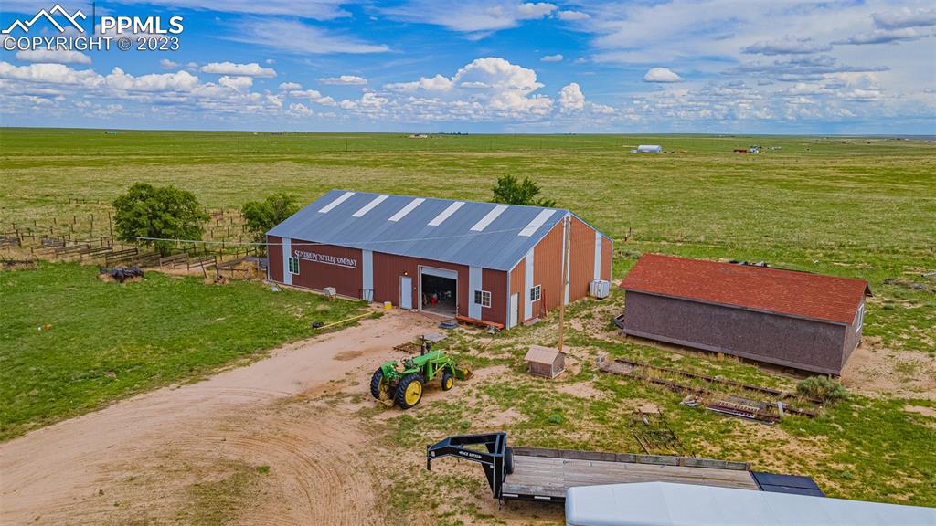13490 South Lauppe Road Yoder, CO 80864 - Photo 36 of 45 a view of a house with a ocean view