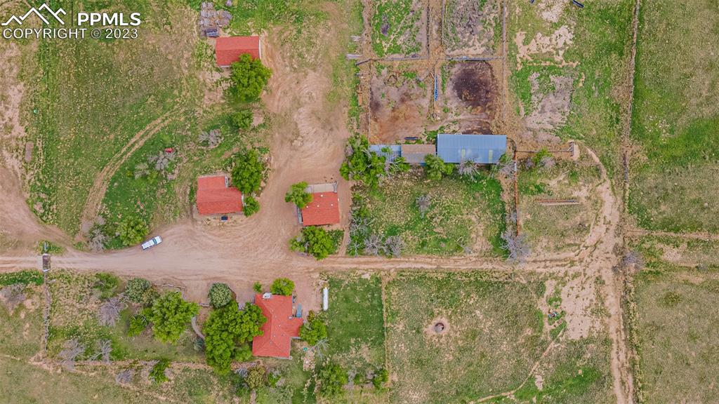 13490 South Lauppe Road Yoder, CO 80864 - Photo 38 of 45 a view of a garden with a fountain