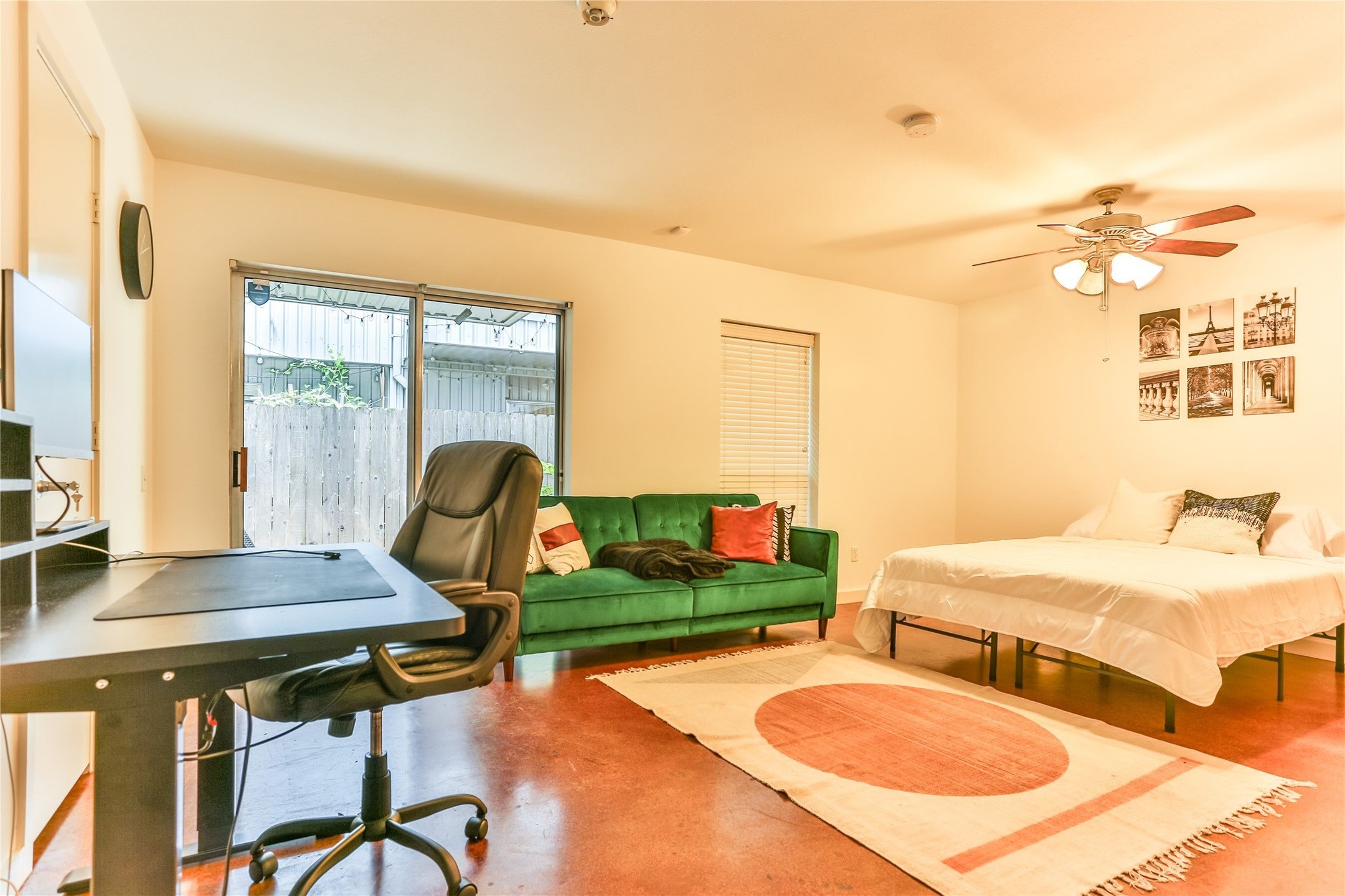 2918 Commerce Street Houston, TX 77003 - Photo 2 of 18 a bedroom with 2 bed and a desk