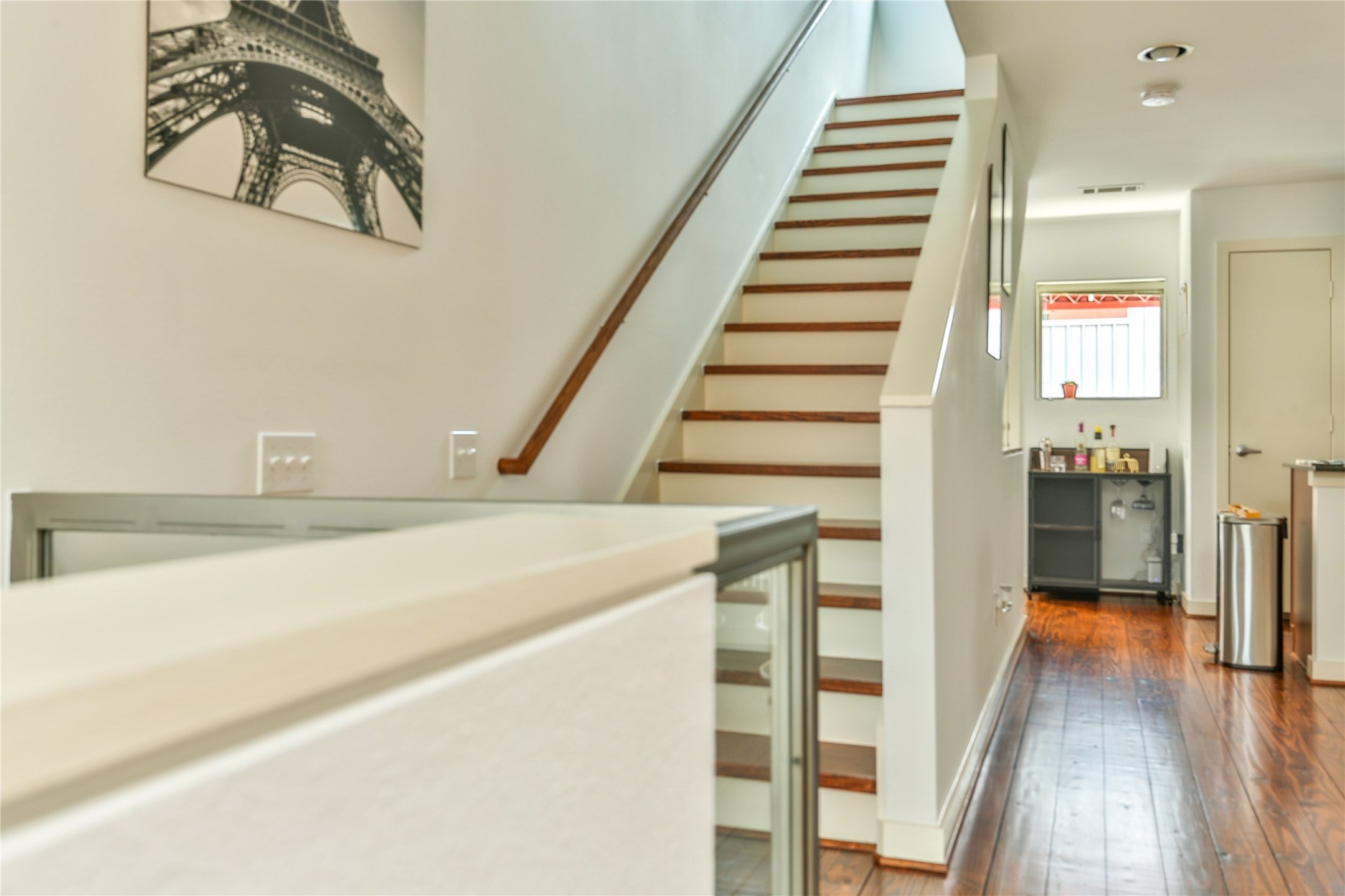 2918 Commerce Street Houston, TX 77003 - Photo 4 of 18 a view of a hallway with wooden floor and entryway