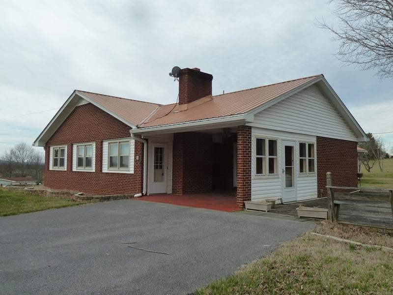 13692 West Gretna Road Sandy Level, VA 24161 - Photo 33 of 58 a front view of a house with yard