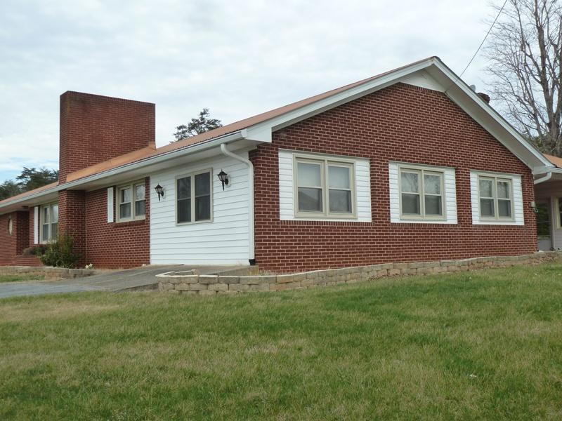 13692 West Gretna Road Sandy Level, VA 24161 - Photo 38 of 58 a view of front of a house with a yard