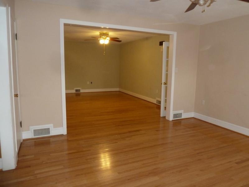 13692 West Gretna Road Sandy Level, VA 24161 - Photo 40 of 58 a view of empty room with wooden floor