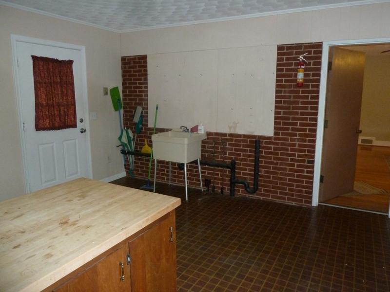 13692 West Gretna Road Sandy Level, VA 24161 - Photo 46 of 58 a view of room with wooden floor and windows
