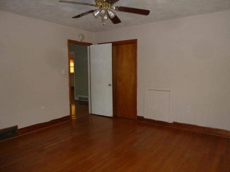 13692 West Gretna Road Sandy Level, VA 24161 - Photo 51 of 58 a view of an empty room with wooden floor