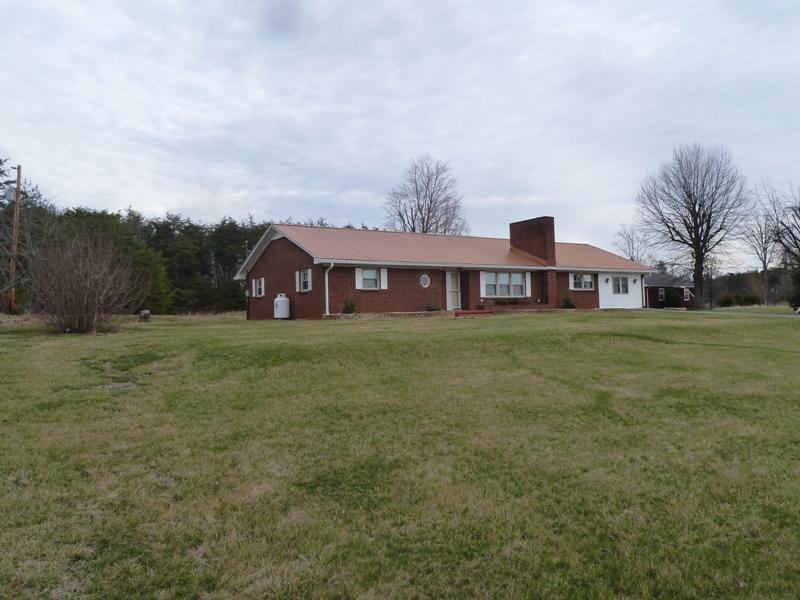 13692 West Gretna Road Sandy Level, VA 24161 - Photo 58 of 58 a house with river in front of it