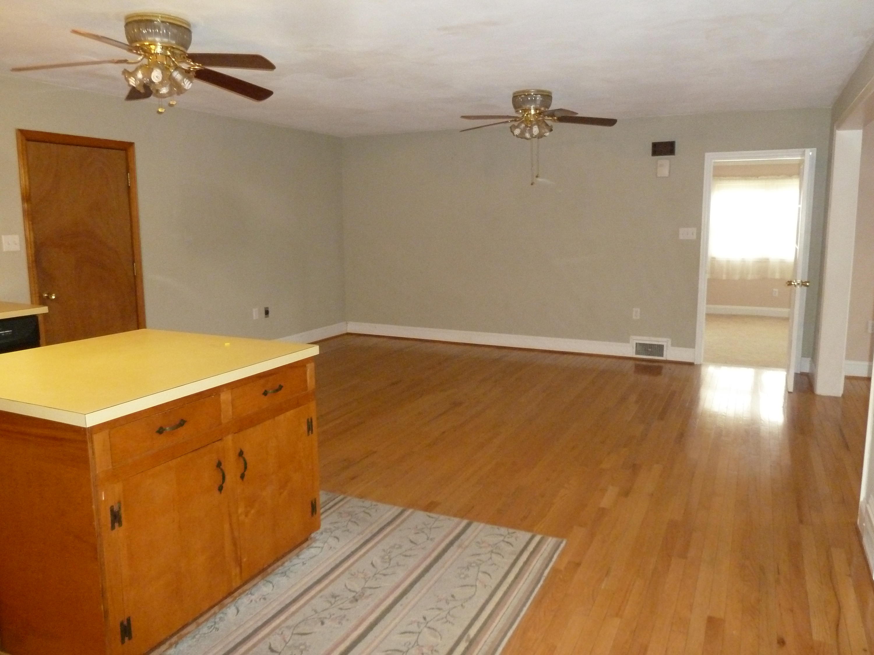 13692 West Gretna Road Sandy Level, VA 24161 - Photo 9 of 58 a view of a room with wooden floor