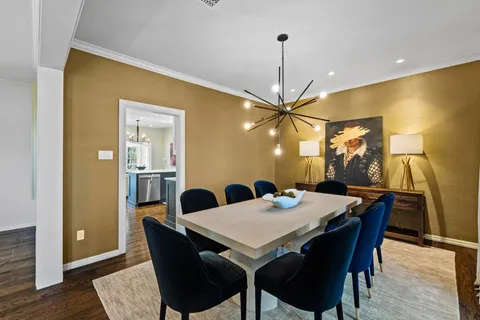 a kitchen with a sink and a stove top oven