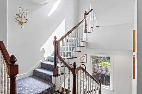 a view of hallway with stairs