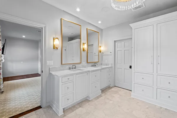 a bathroom with a bathtub and shower