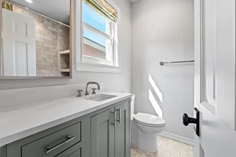 a bathroom with a bathtub and shower