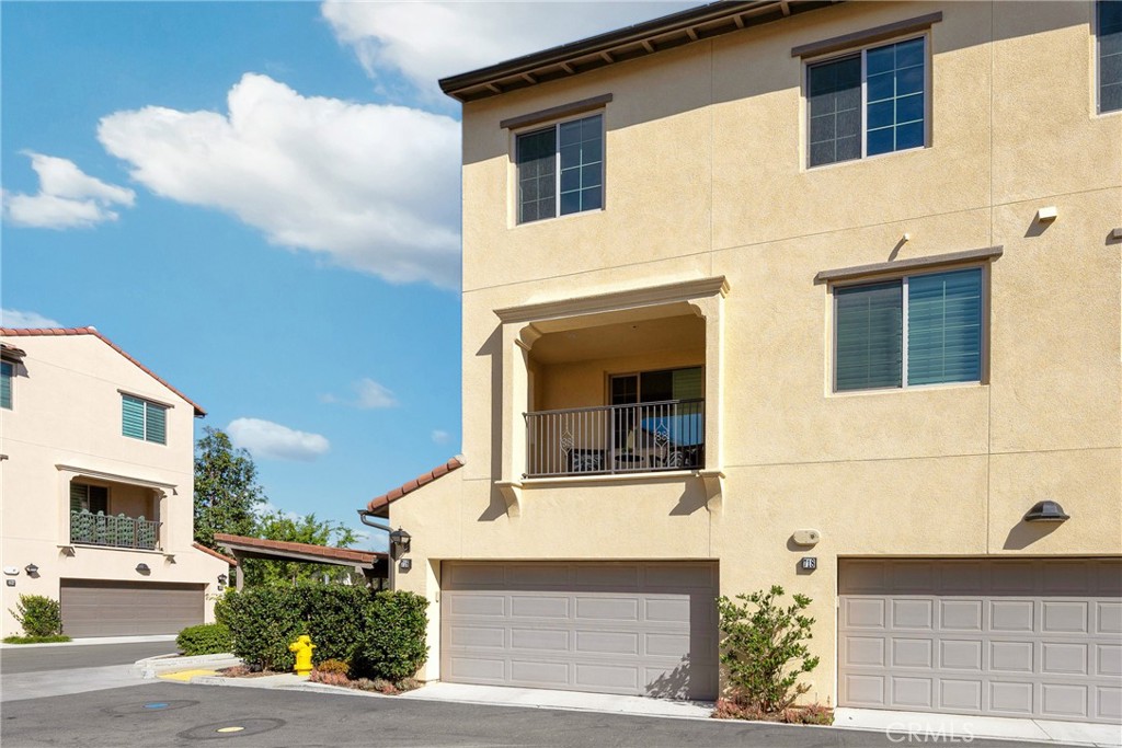 716 Spring Garden Irvine, CA 92618 - Photo 38 of 44 a front view of a house with a yard