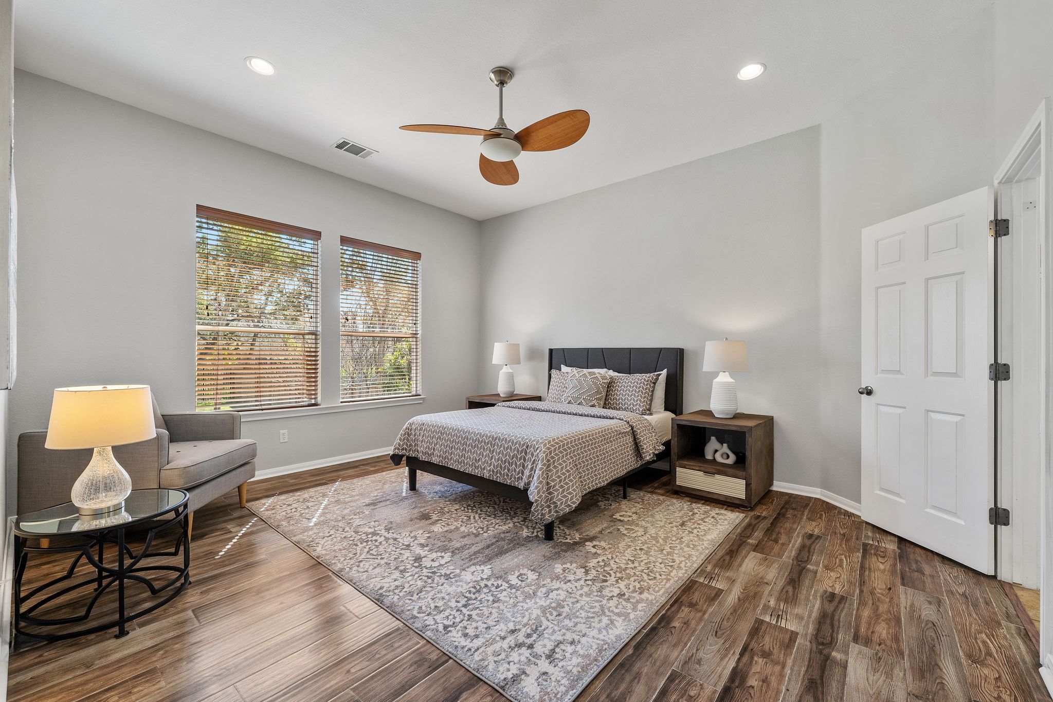 9905 Savannah Ridge Drive Austin, TX 78726 - Photo 19 of 35 Tucked away at the back of the home, the primary suite is a quiet retreat that looks out over the landscaped backyard