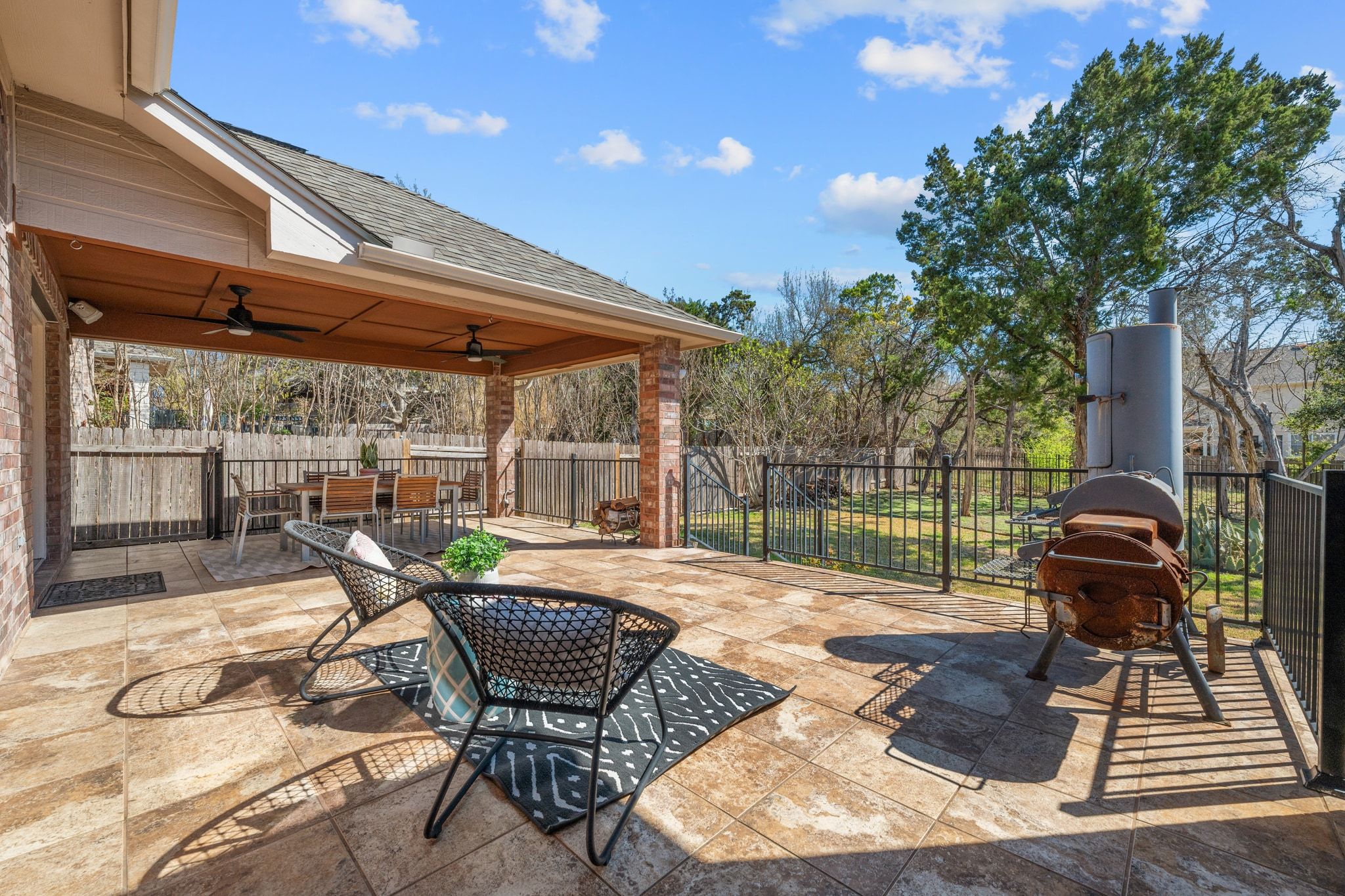 9905 Savannah Ridge Drive Austin, TX 78726 - Photo 30 of 35 This outdoor space transitions smoothly from the living room, making it a natural spot for weekend gatherings