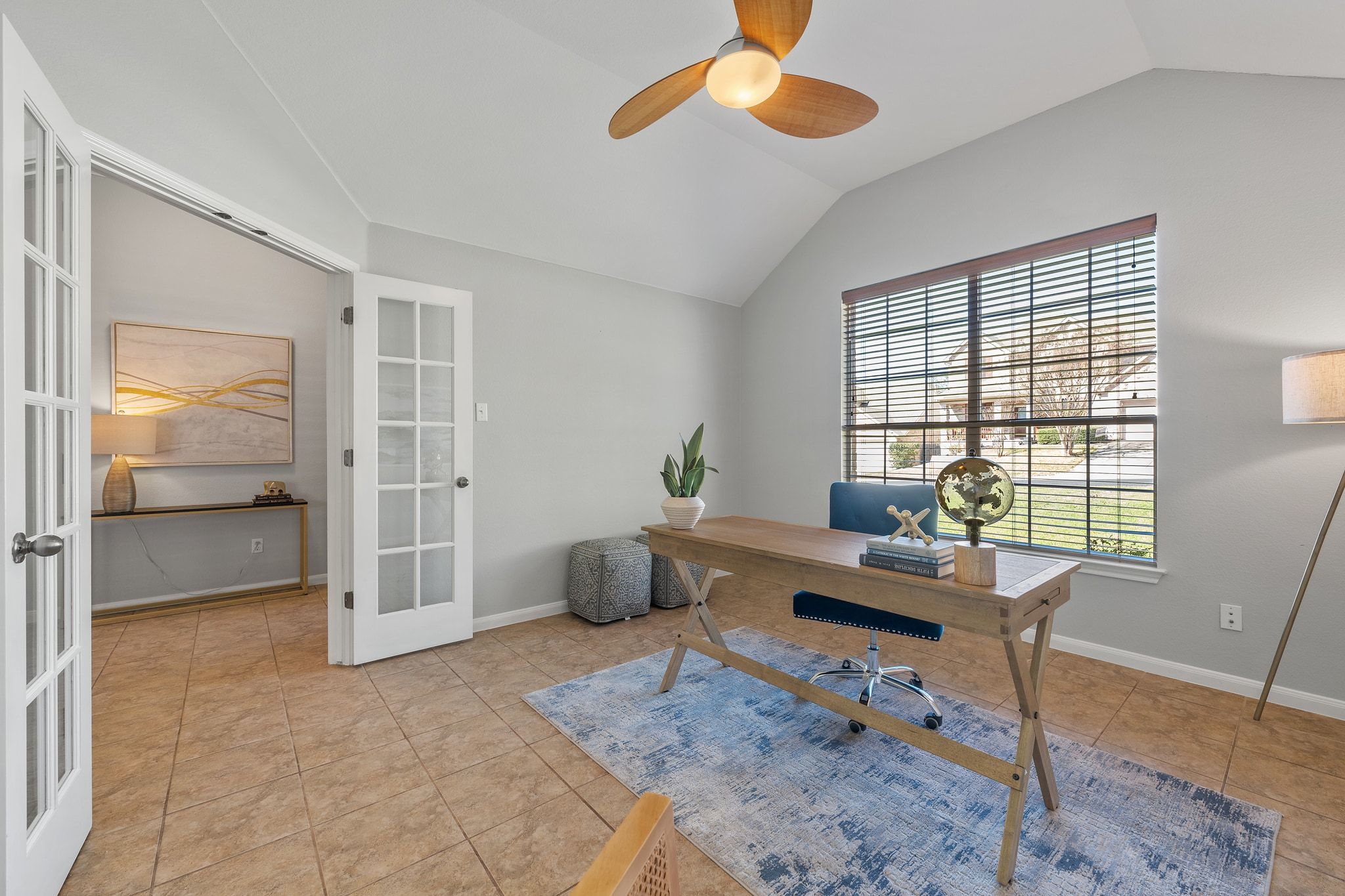 9905 Savannah Ridge Drive Austin, TX 78726 - Photo 6 of 35 Located right at the front of the home, this large office features glass doors to keep the workspace feeling connected