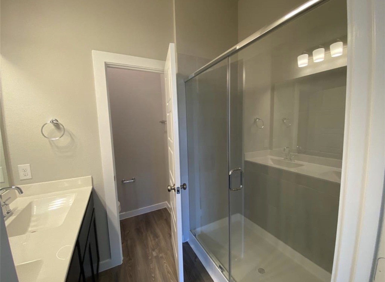 3119 Spanish Oak Lane Rosenberg, TX 77471 - Photo 13 of 18 a bathroom with a tub shower and sink