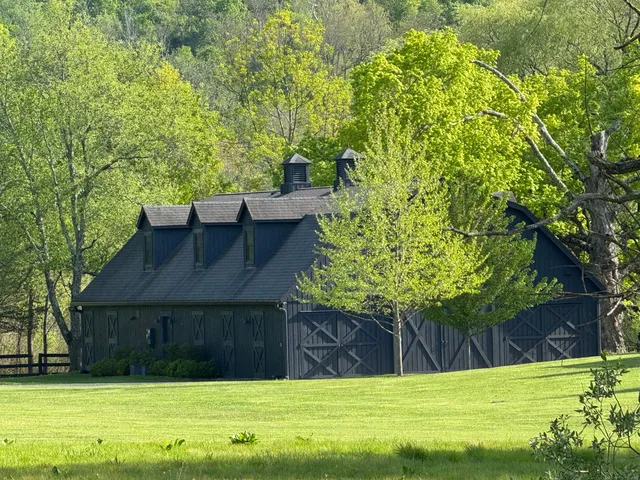 a view of swimming pool with an outdoor seating