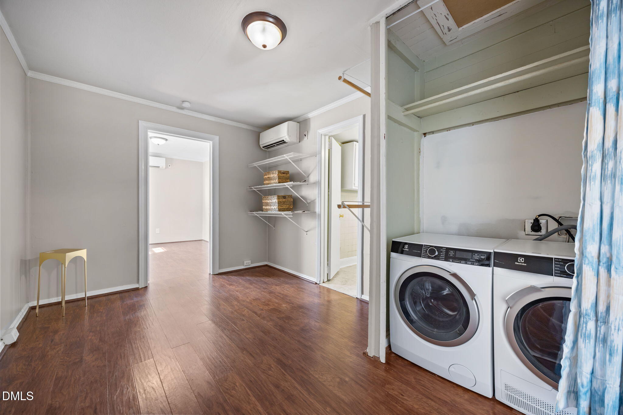 209 Weston Road Garner, NC 27529 - Photo 15 of 37 a view of a storage & utility room with washer and dryer