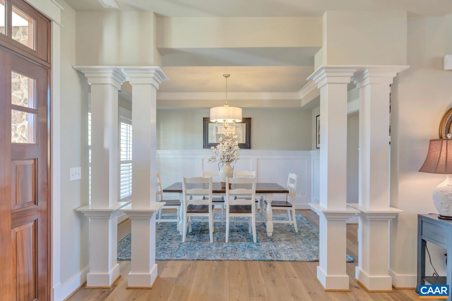 3 Jarmans Gap Road, Unit LOT 3 JARMANS GAP Crozet, VA 22932 - Photo 13 of 32 a dining room with furniture and chandelier