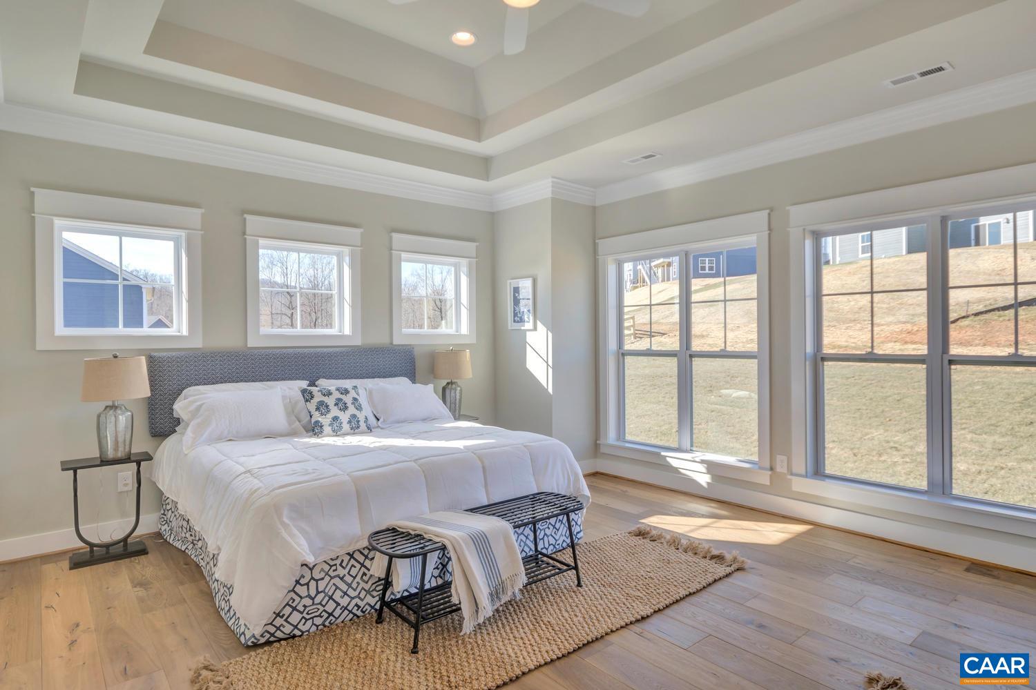 3 Jarmans Gap Road, Unit LOT 3 JARMANS GAP Crozet, VA 22932 - Photo 14 of 32 a bedroom with a bed and a large window