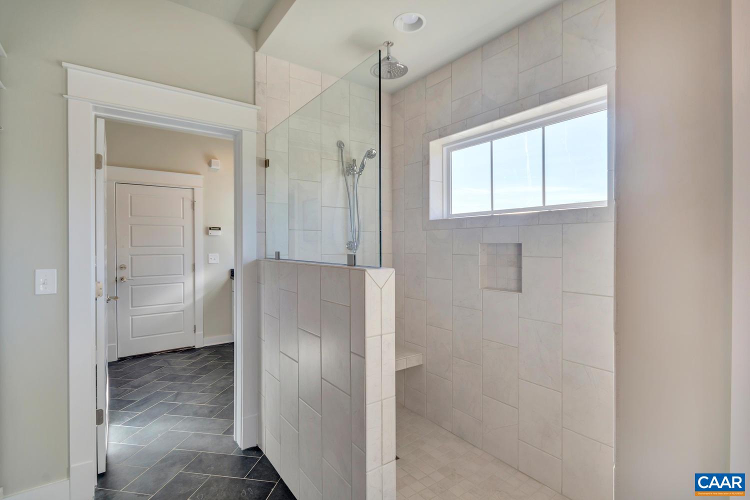 3 Jarmans Gap Road, Unit LOT 3 JARMANS GAP Crozet, VA 22932 - Photo 15 of 32 a bathroom with a shower and a sink