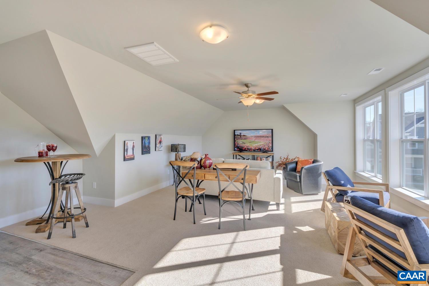 3 Jarmans Gap Road, Unit LOT 3 JARMANS GAP Crozet, VA 22932 - Photo 26 of 32 a view of a dining room with furniture a chandelier and wooden floor