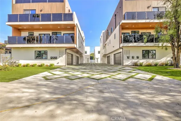 a view of building with an outdoor space and seating area