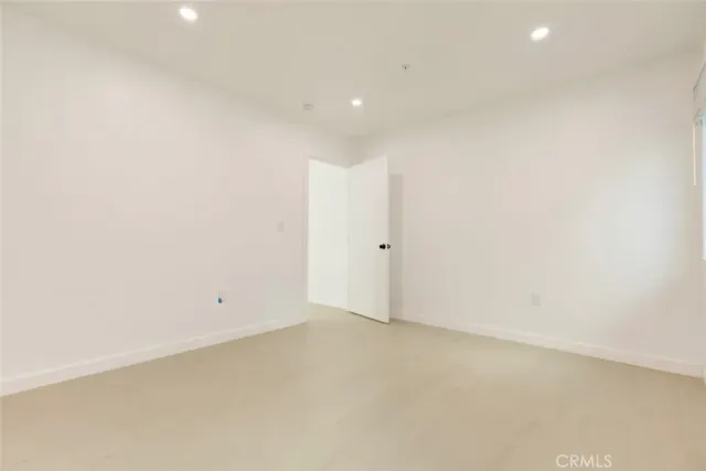 an empty room with an entryway