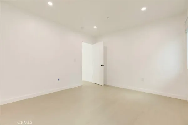 an empty room with an entryway