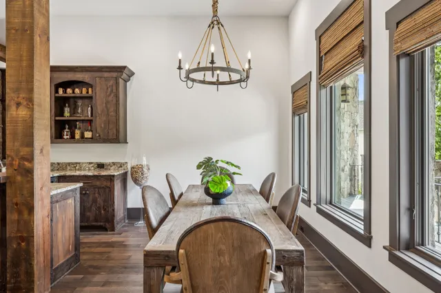 a bedroom with a bed and a table