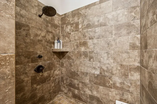 a utility room with sink dryer and washer