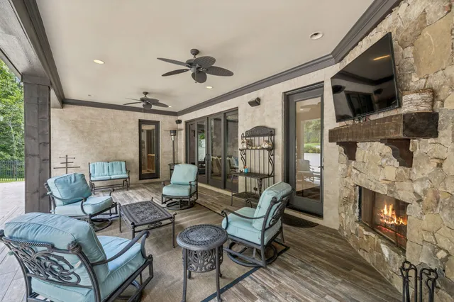 a bathroom with a sink and mirror with toilet